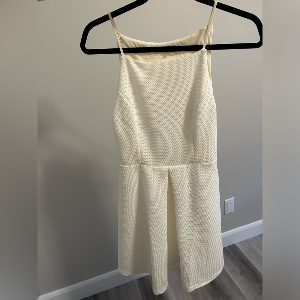 SUGAR LIPS - Beautiful white skater style dress with key hole back!